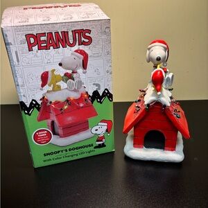 Peanuts Snoopy's Dog House Tabletop Holiday Figurine with LED Christmas lights